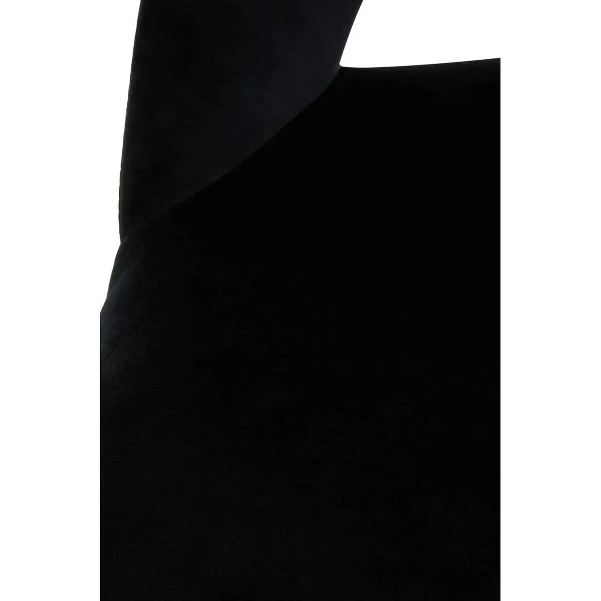 Closeup of black velvet chair upholstery showing soft fabric texture