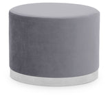Round stool featuring a soft grey upholstered top and a sleek silver base, designed for modern home decor