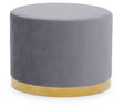 Round stool featuring a soft grey upholstered top and a sleek gold base, designed for modern home decor