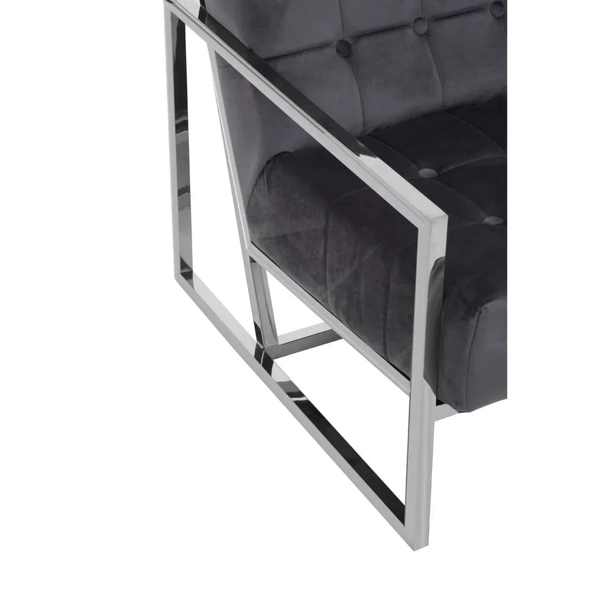 Close view of chrome frame armchair with black tufted velvet upholstery