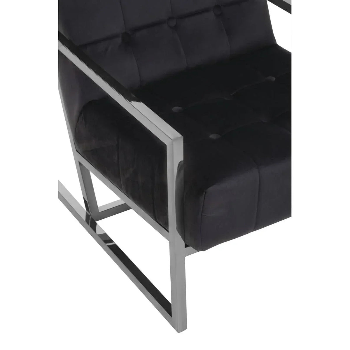 Black velvet armchair with chrome metal frame and tufted seat detail