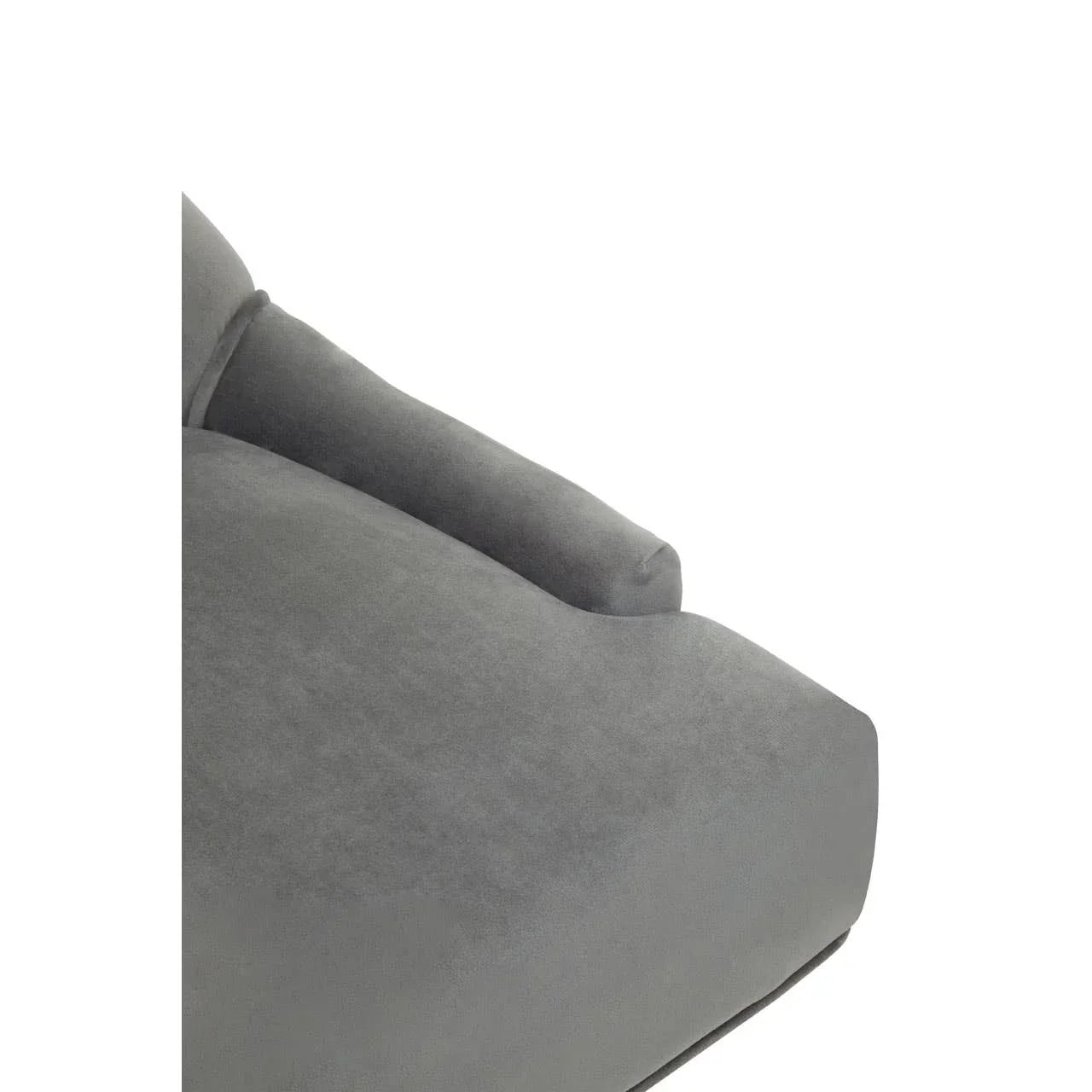 Close-up of grey sofa armrest and seat cushion upholstered in soft fabric