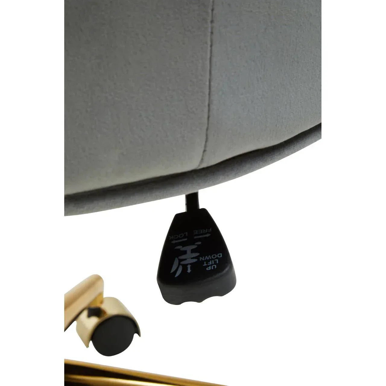 Close-up of office chair height adjustment lever and gold wheel base