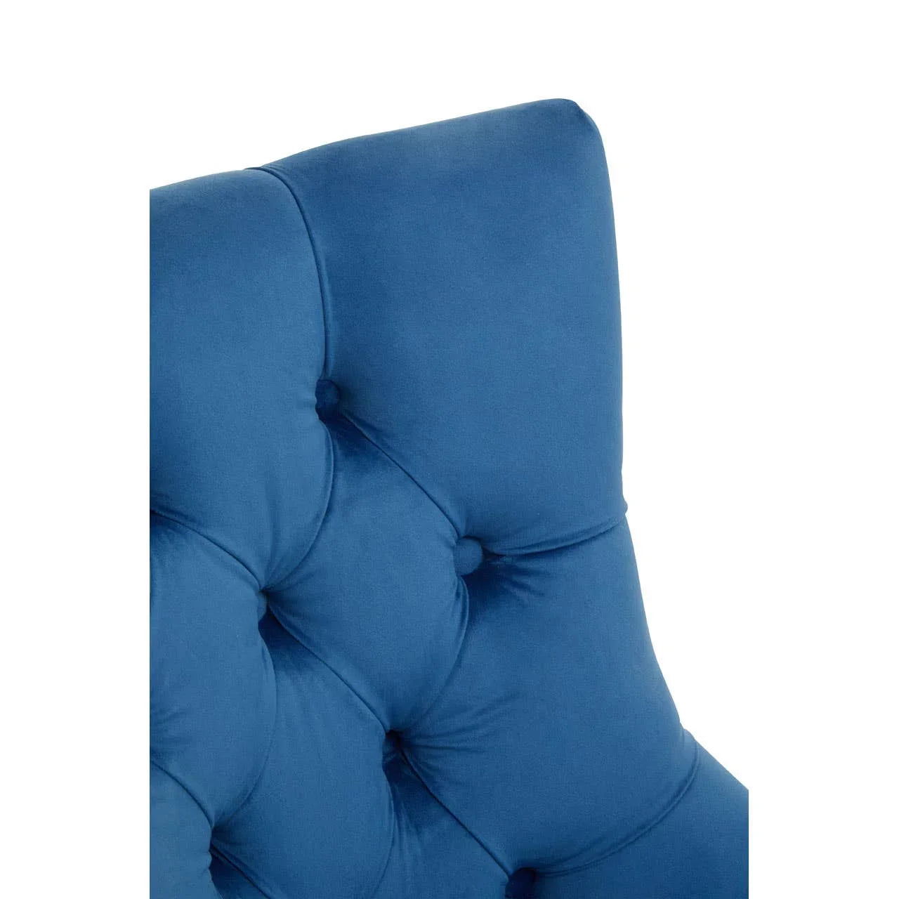 Blue velvet chair backrest with button tufted upholstery close-up