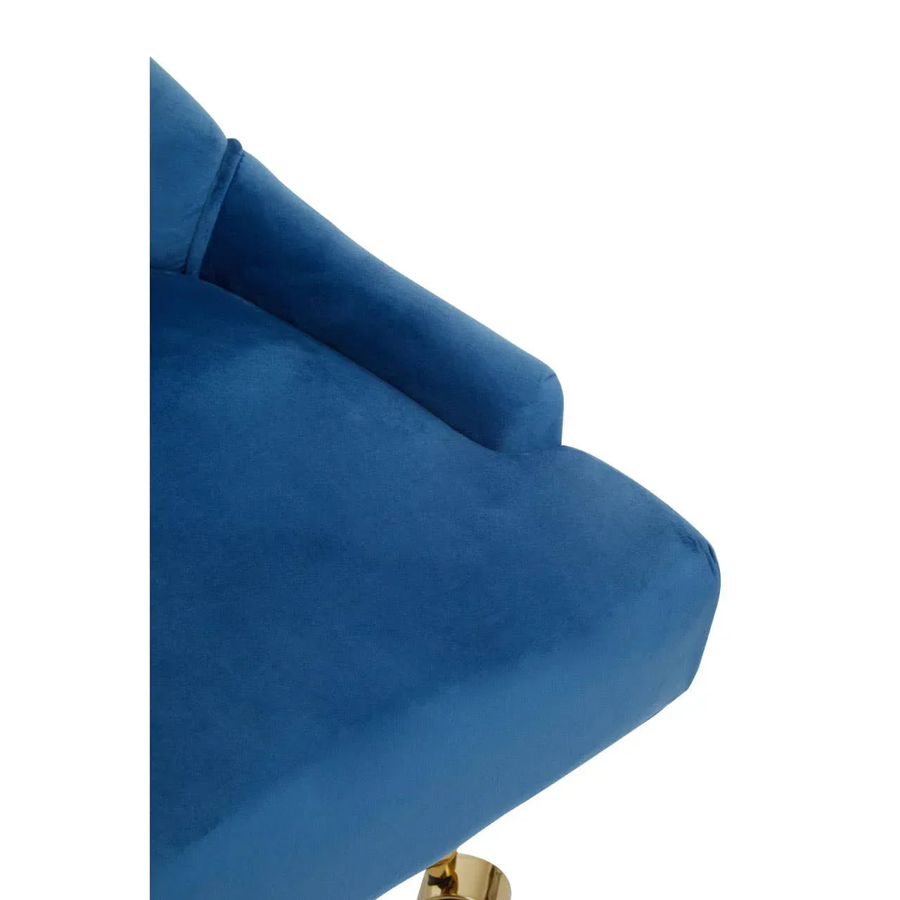 Blue velvet armchair close-up showing seat, armrest and gold metal leg detail