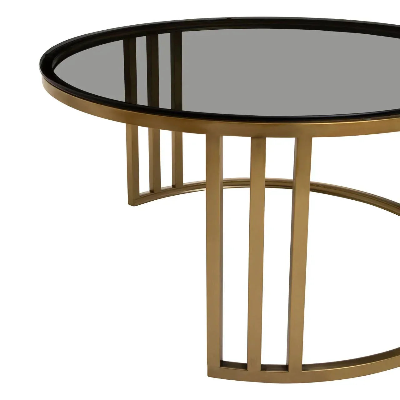 Round glass top dining table with gold metal frame and geometric legs