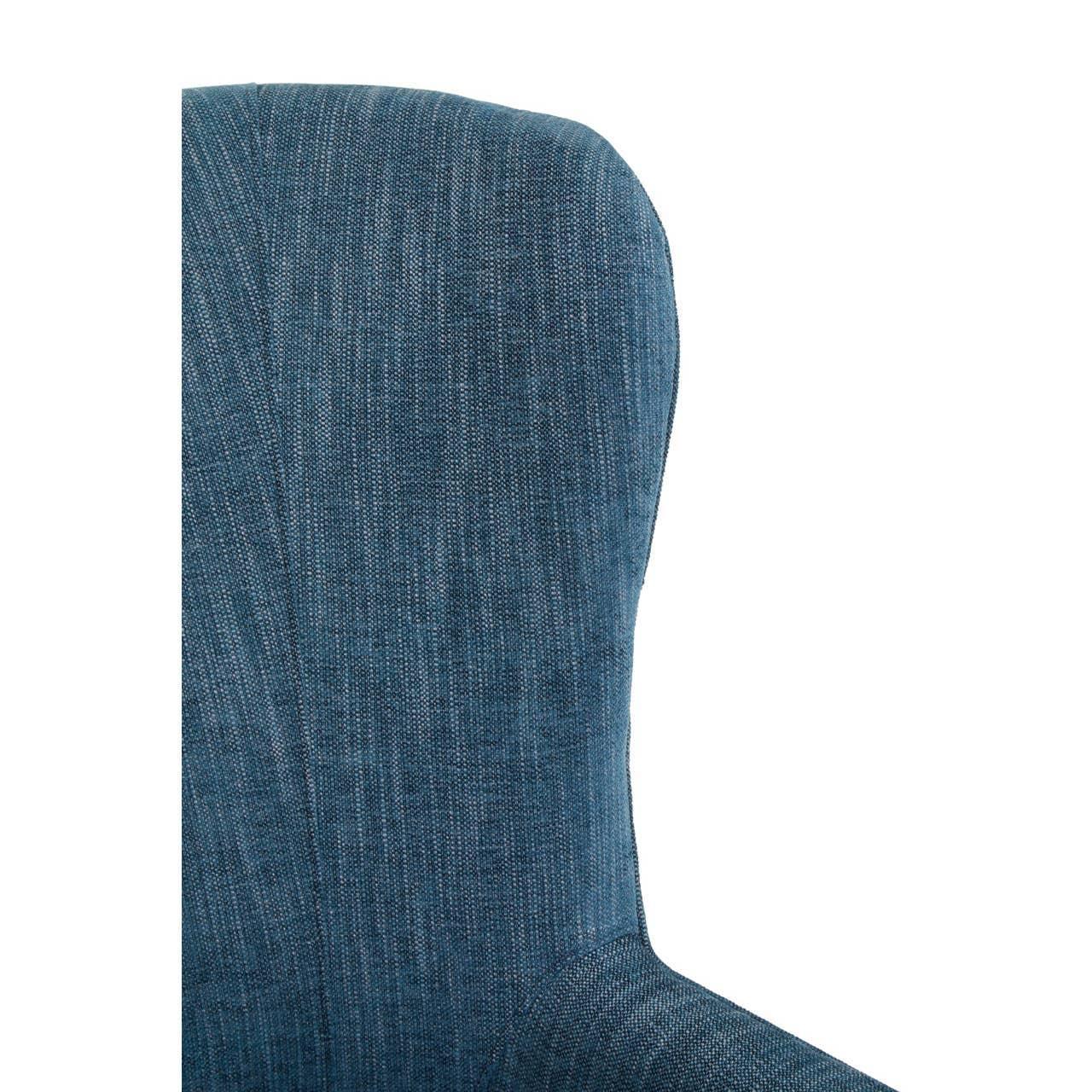 Blue fabric armchair high backrest close-up showing textured upholstery detail