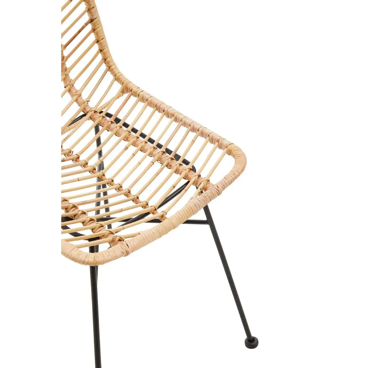 Close-up of rattan dining chair with black metal legs and woven seat detail
