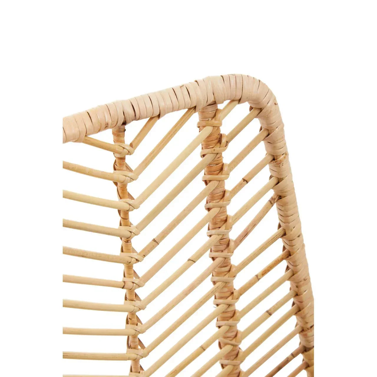 Closeup of natural rattan chair backrest with diagonal weaving detail