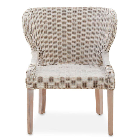 Wicker chair with a curved backrest and armrests, featuring a light beige woven design and wooden legs
