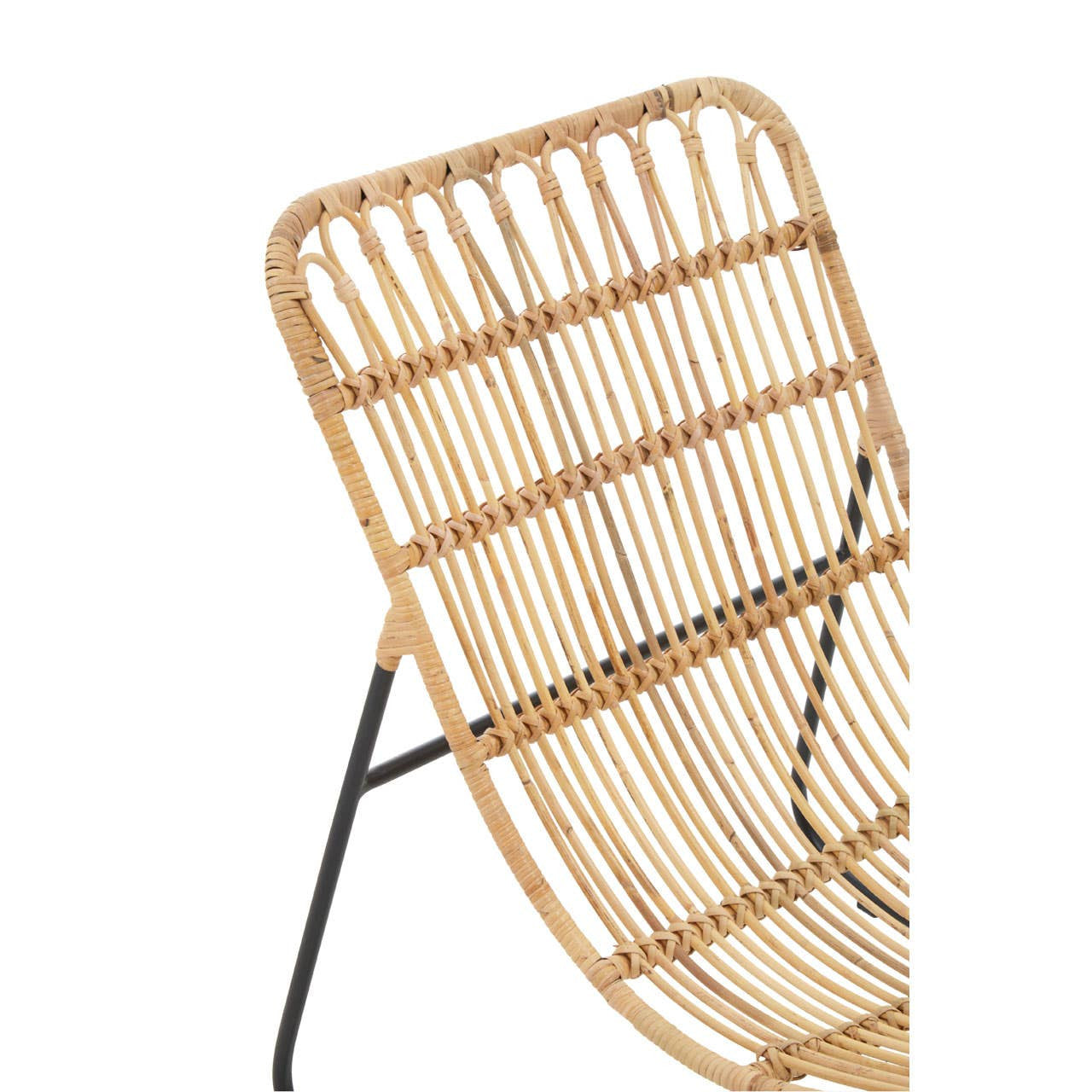 A close-up view of the Manado Rattan Chair, showcasing its woven rattan backrest and seat, supported by a sleek black metal frame. The design features a modern, minimalist aesthetic with clean lines and a natural finish. The footstool is partially visible, complementing the chair's style