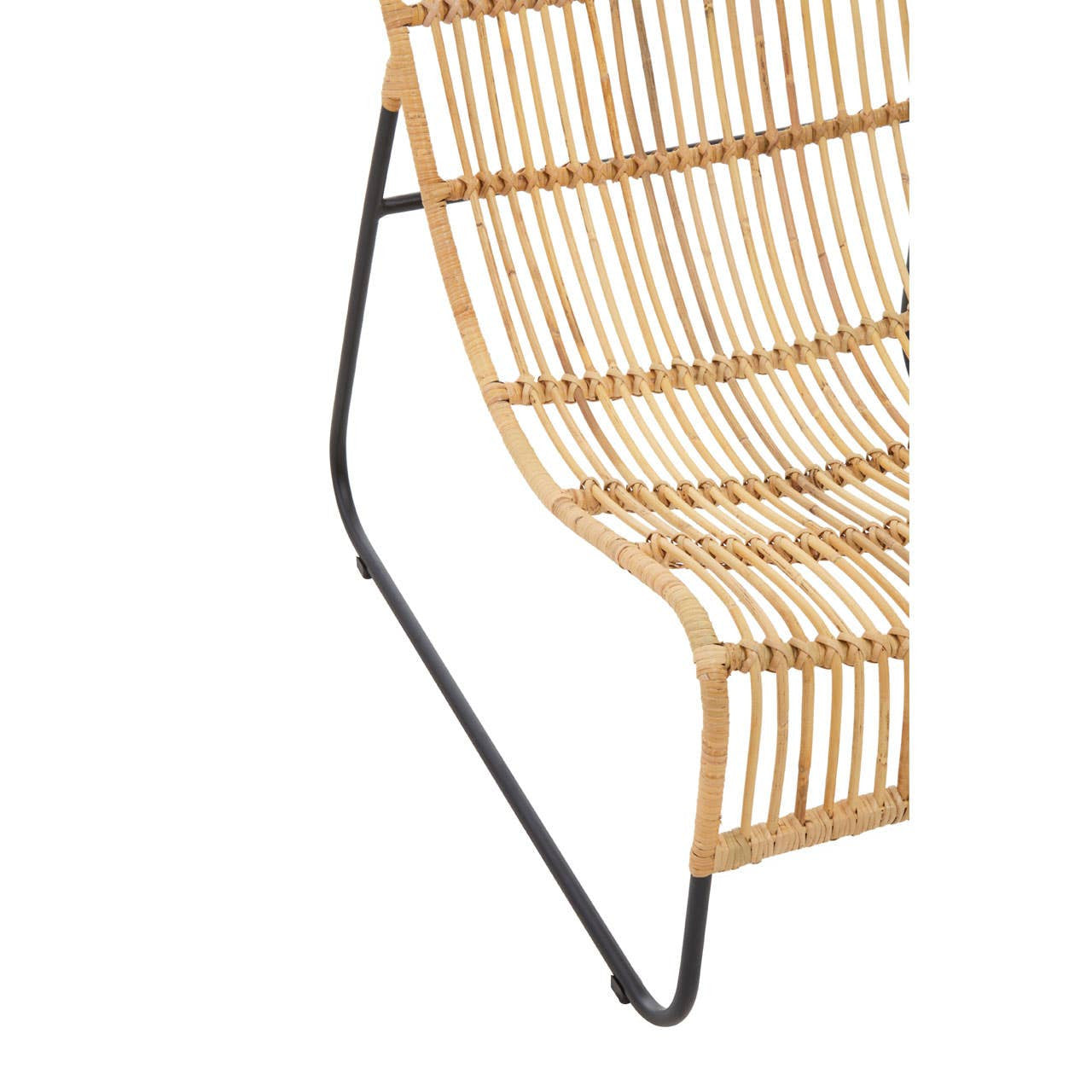 Close-up view of the Manado Rattan Chair showcasing its woven rattan seat and backrest in a natural finish, supported by a sleek black metal frame. The footstool is partially visible, featuring a matching rattan design