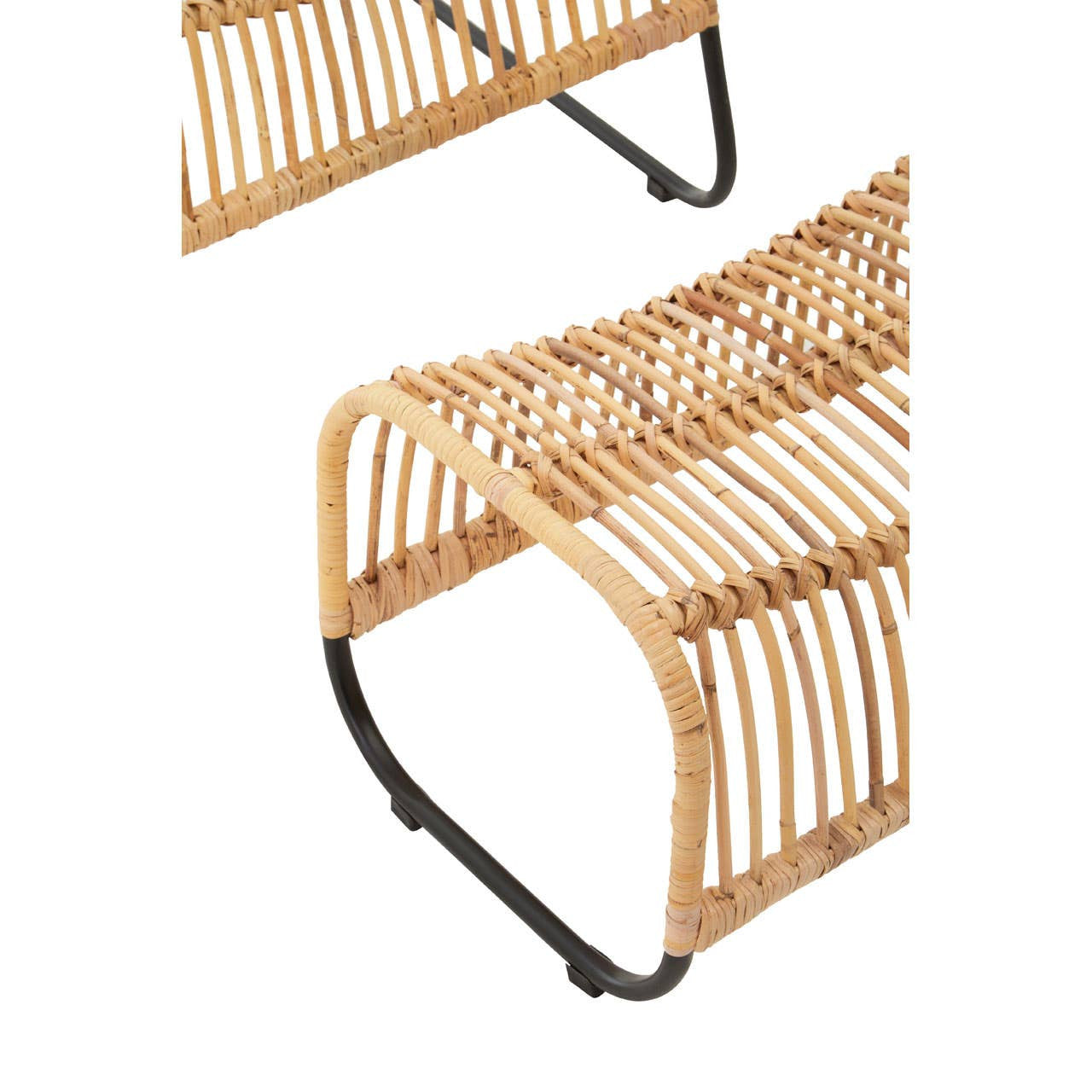 Rattan chair and footstool set featuring a curved, slatted design with a natural finish and black metal legs, showcasing a modern and minimalist aesthetic suitable for home decor