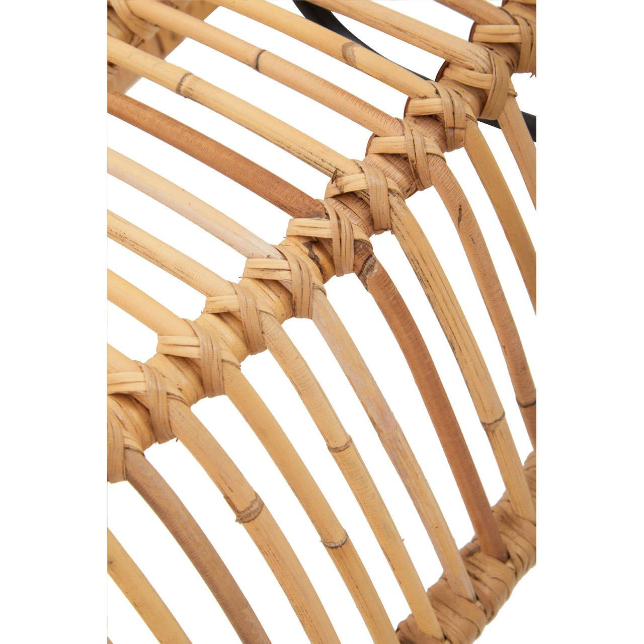 Close-up view of the woven rattan structure of the Manado Rattan Chair and Footstool Set, showcasing the natural bamboo color and intricate pattern of the rattan strands. The background is plain white, emphasizing the texture and craftsmanship of the furniture