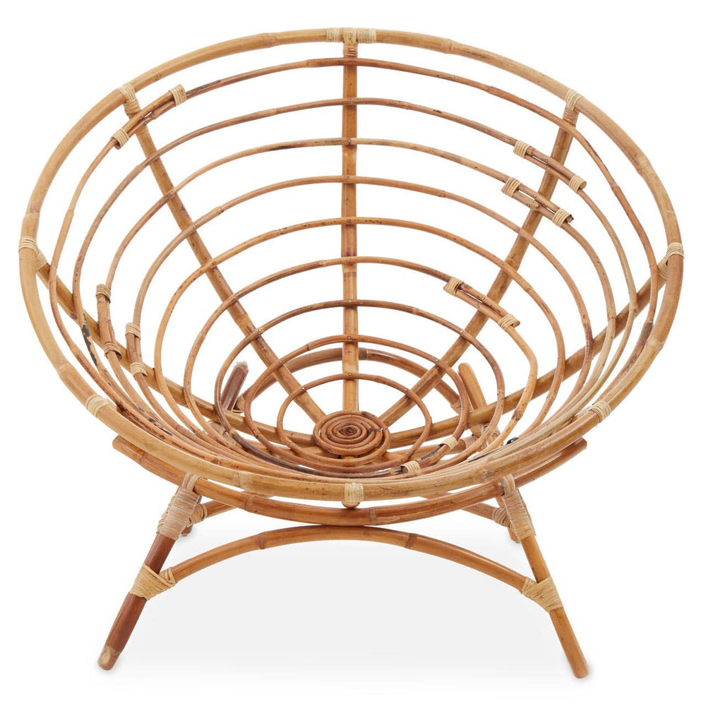 Natural rattan chair with a circular, open-weave design and a sturdy, curved frame. The chair features a wide, bowl-like seat and four tapered legs, showcasing a warm, light brown finish that highlights the texture of the rattan