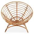 Natural rattan chair with a circular, open-weave design and a sturdy, curved frame. The chair features a wide, bowl-like seat and four tapered legs, showcasing a warm, light brown finish that highlights the texture of the rattan