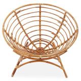 Natural rattan chair with a circular, open-weave design and a sturdy, curved frame. The chair features a wide, bowl-like seat and four tapered legs, showcasing a warm, light brown finish that highlights the texture of the rattan