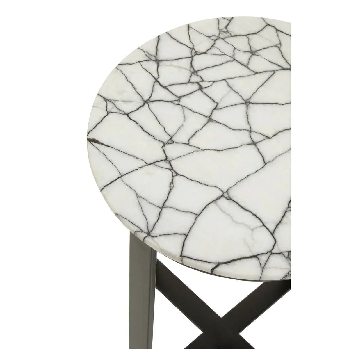 Round marble side table with black metal legs and white veined tabletop close-up