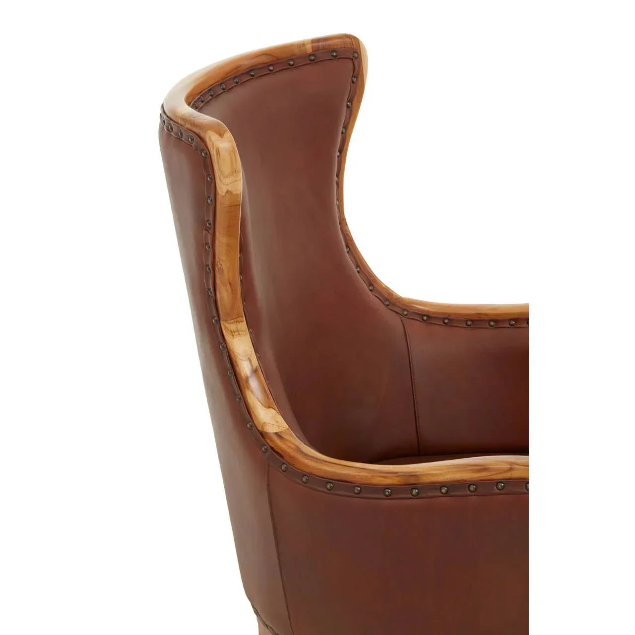 Brown leather armchair with wooden trim and nailhead detail, close-up side view