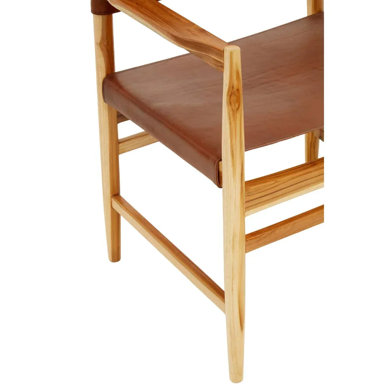 Wooden dining chair with tan leather seat close-up
