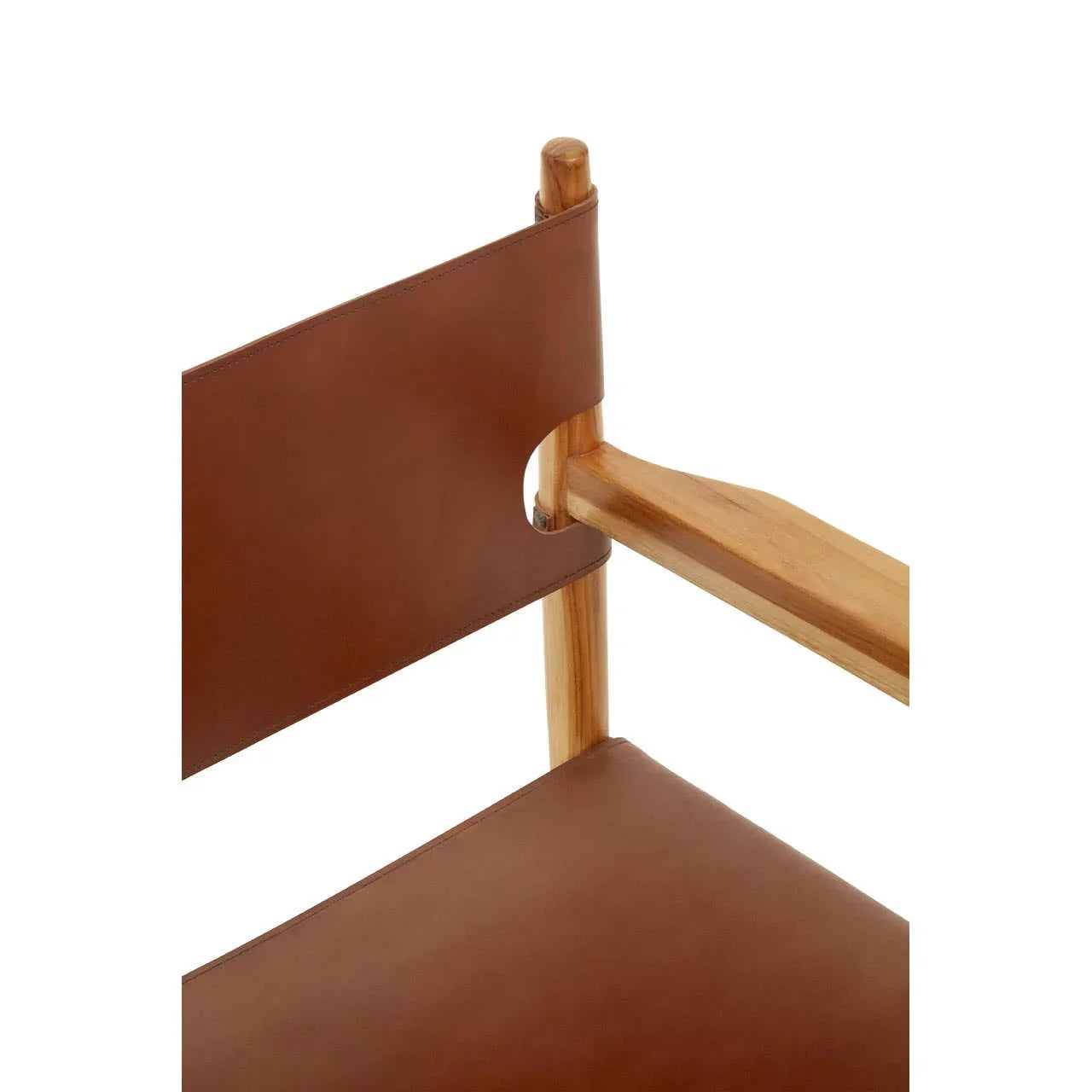 Closeup of brown leather and wood dining chair backrest and armrest