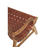 Closeup of woven leather chair seat with natural wood frame and curved armrest