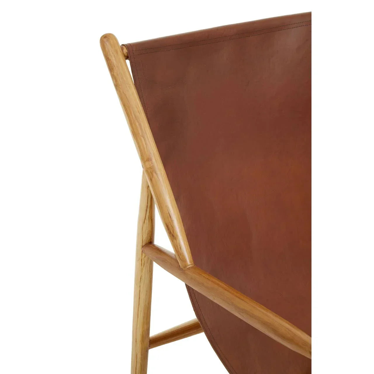 Close-up of leather accent chair with natural wood frame and brown seat