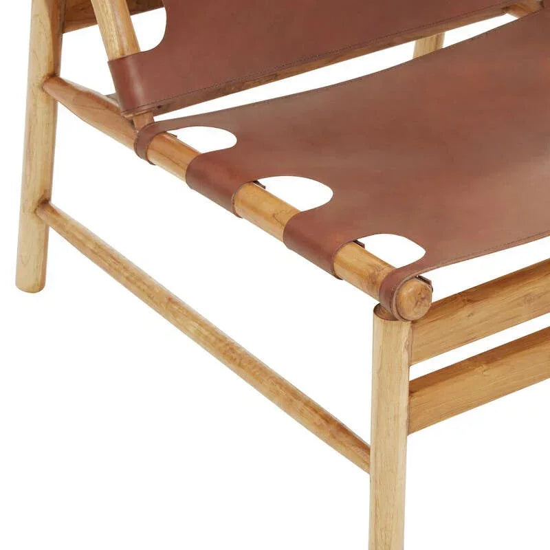 Brown leather lounge chair seat with light wood frame and modern cutout detail