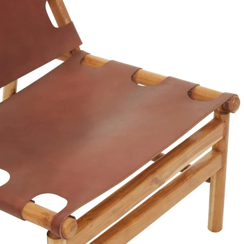 Closeup of wooden accent chair with brown leather seat and backrest