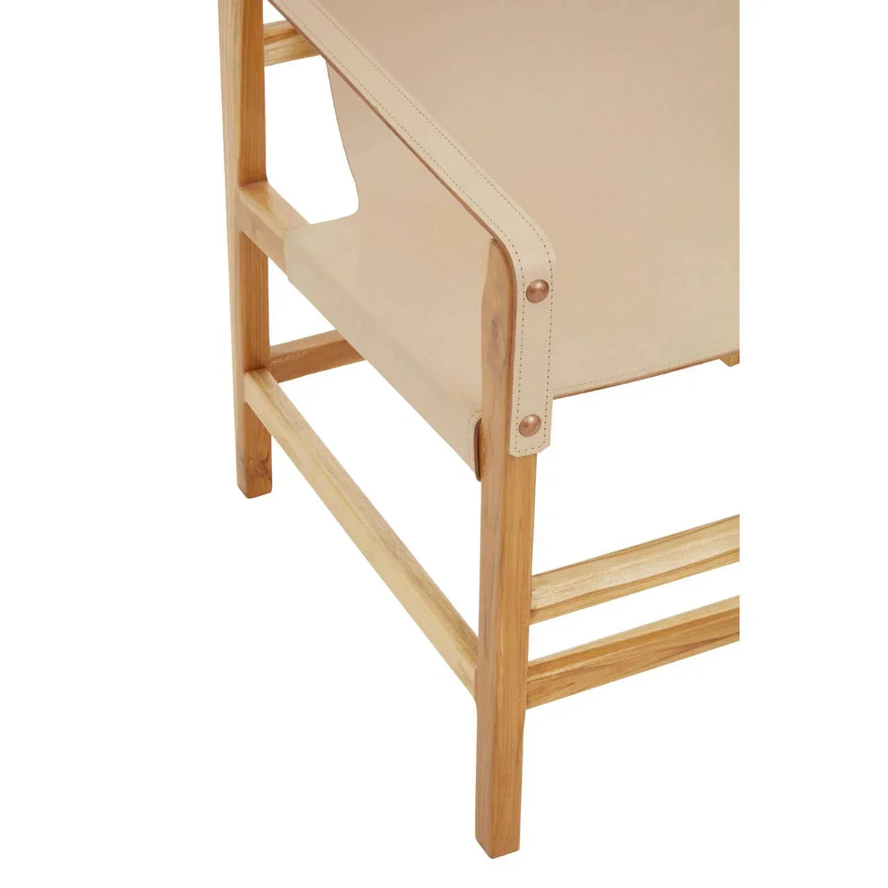 Close-up of beige leather seat and wooden chair legs with visible stitching and brass rivets