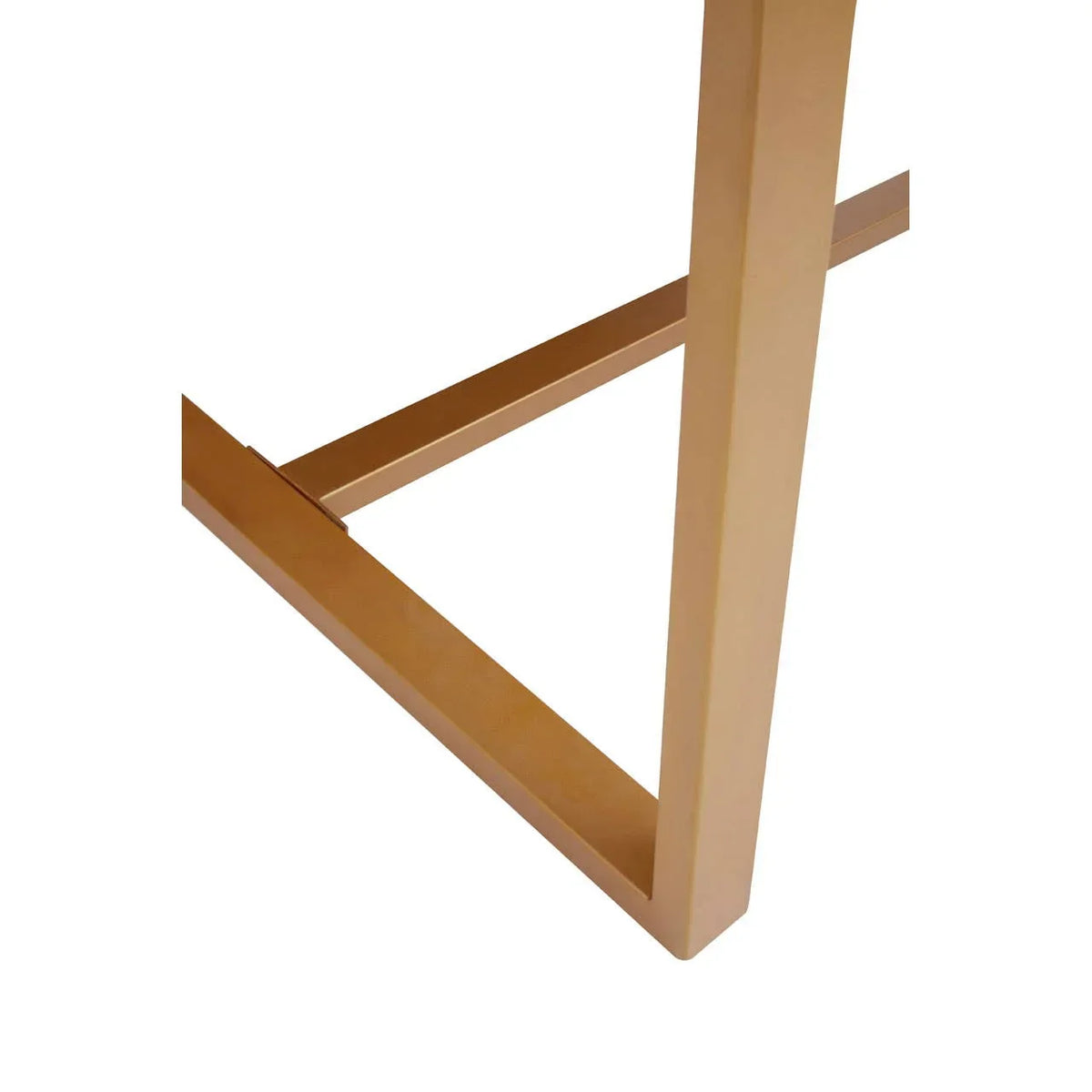 Gold metal table leg with modern geometric frame, close-up of furniture support structure