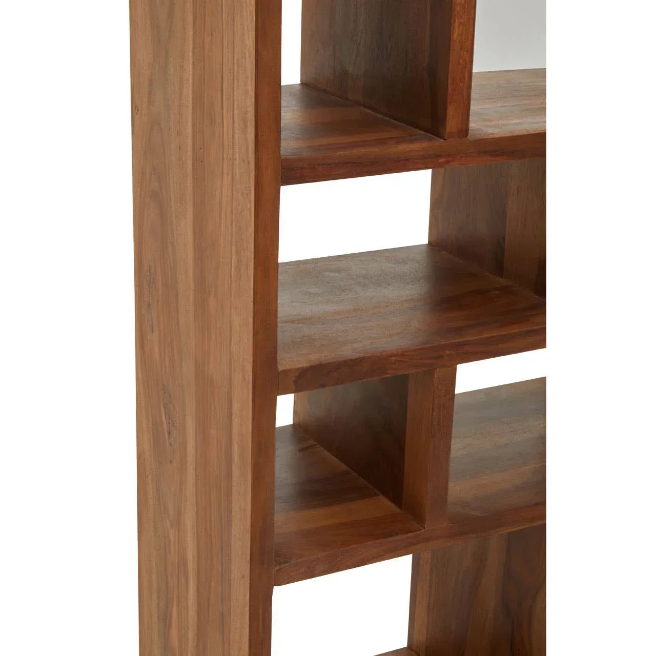 Closeup of wooden bookshelf shelving with visible grain and modern open cube design