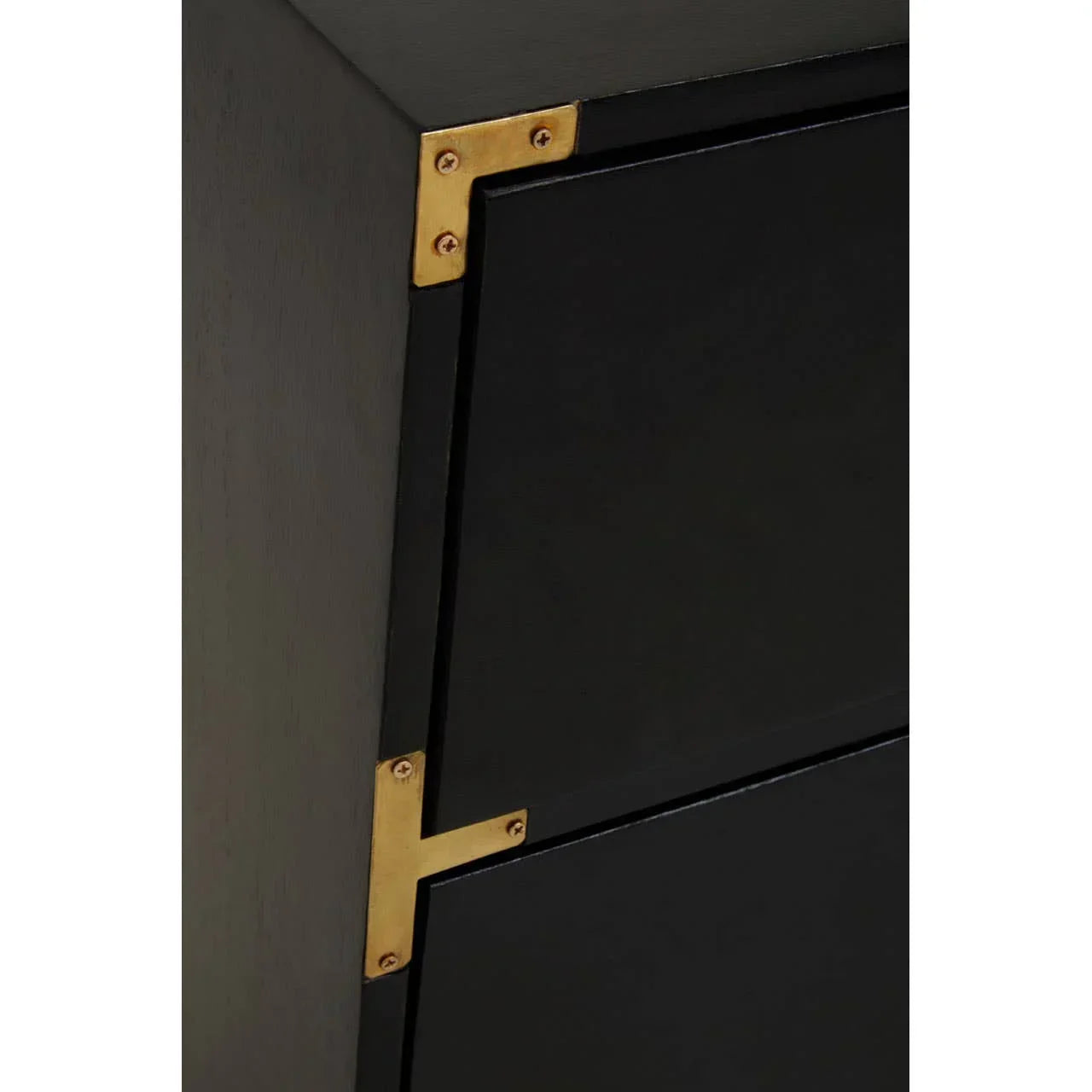 Black cabinet corner with brass hardware and matte black drawer detail