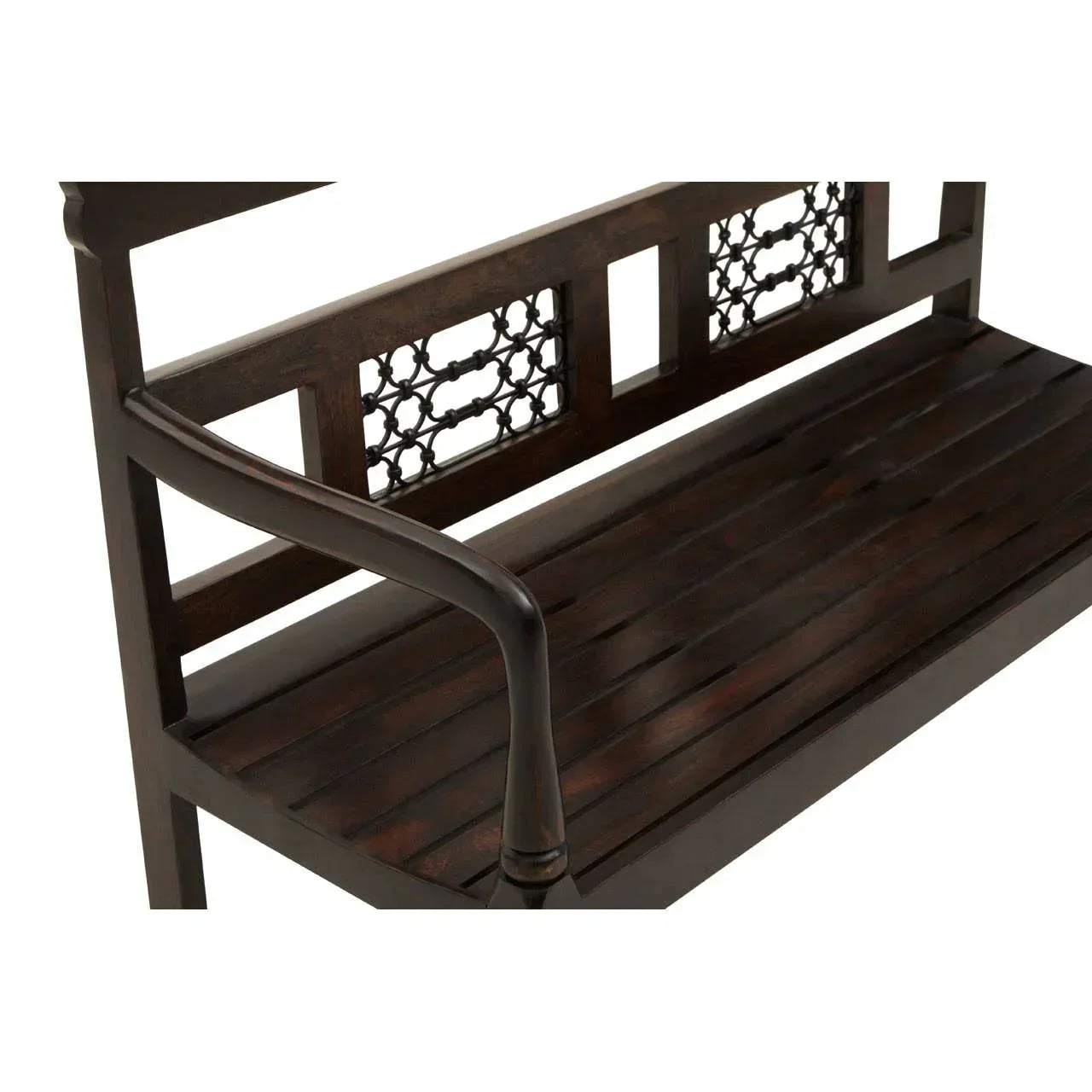 Dark wood bench with slatted seat and decorative metal backrest panel, close side view
