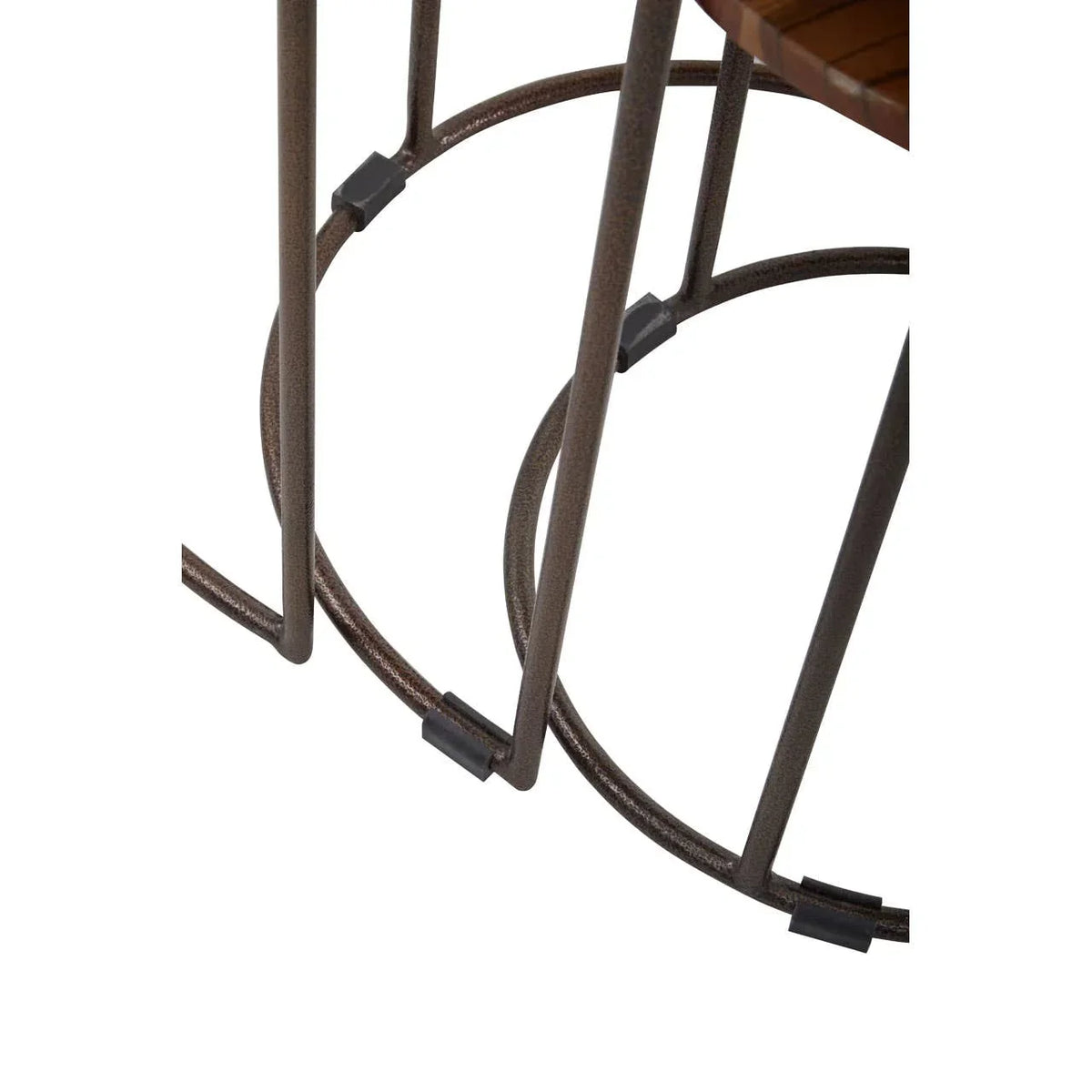Metal table frame detail with circular support bars and brown powder-coated finish