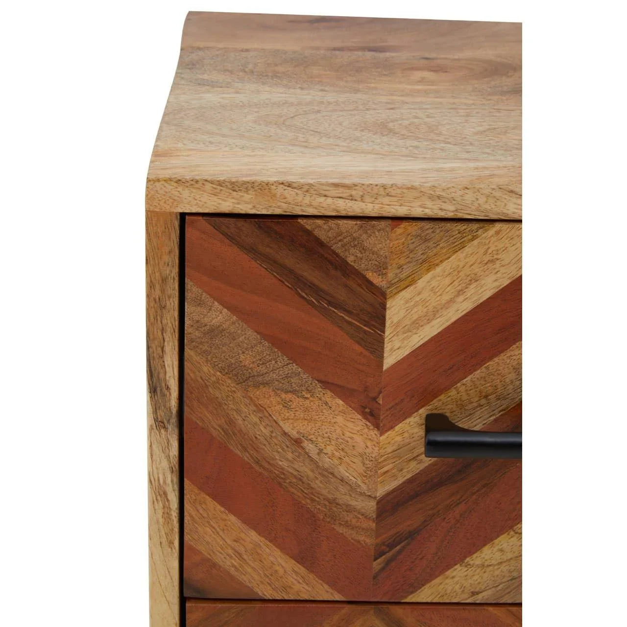 Chevron pattern wooden drawer front with black handle, close-up on natural wood grain