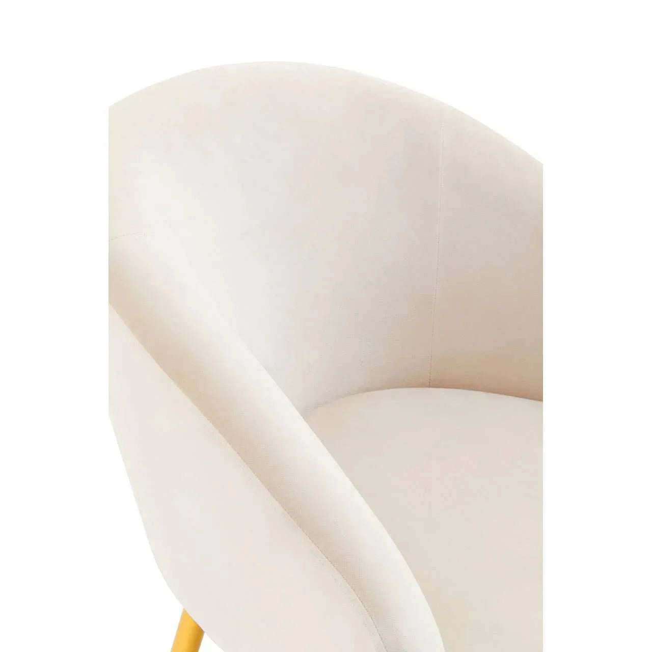 Cream fabric armchair with curved backrest and yellow wooden legs, close-up view