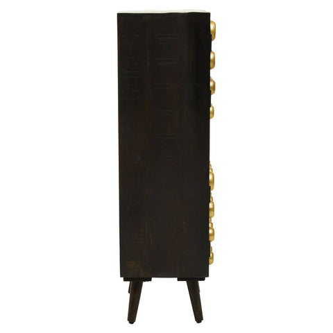Tall cabinet made of mango wood with a dark finish, featuring two doors with brass effect handles. The cabinet stands on four tapered legs and has a sleek, modern design. The side displays a row of circular brass accents