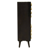 Tall cabinet made of mango wood with a dark finish, featuring two doors with brass effect handles. The cabinet stands on four tapered legs and has a sleek, modern design. The side displays a row of circular brass accents