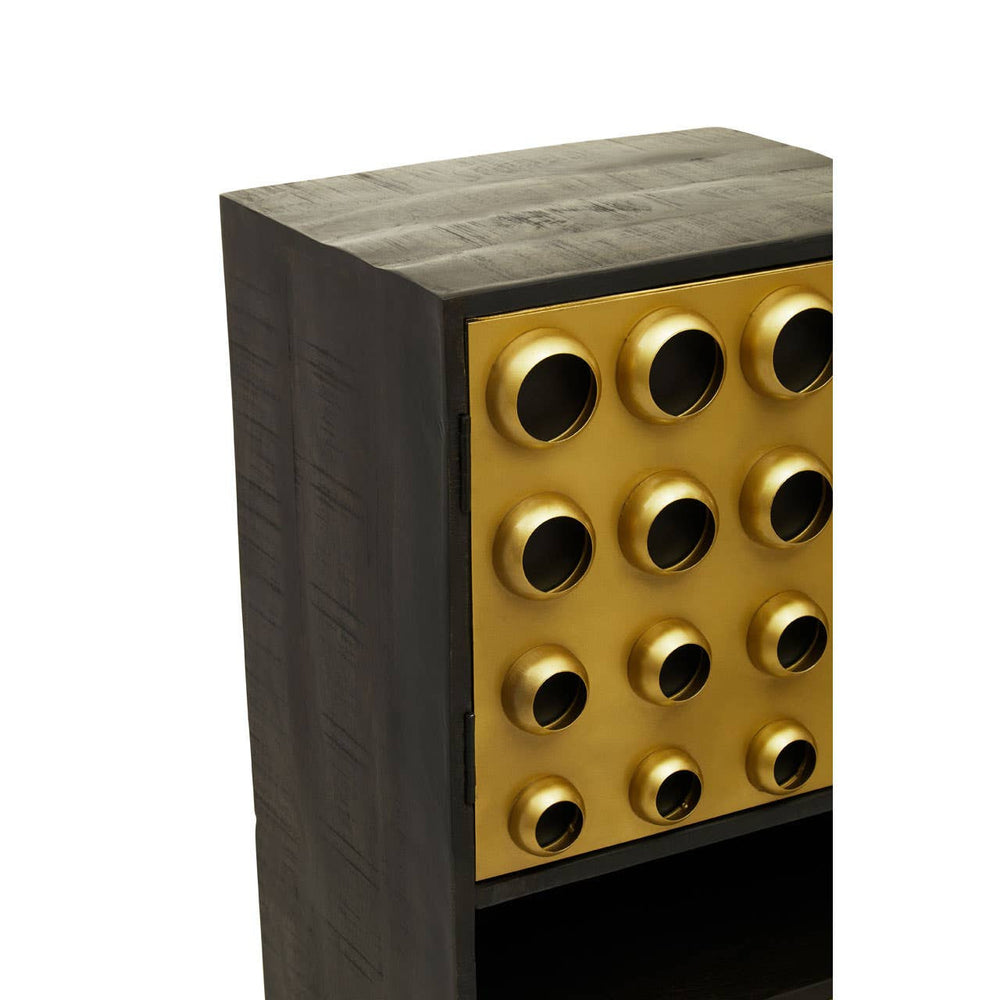 Tall cabinet featuring a dark mango wood finish with a brass effect panel on the front. The brass panel has a grid of circular cutouts, creating a modern design element. The cabinet has two doors and an open shelf at the bottom, showcasing a stylish and functional storage solution