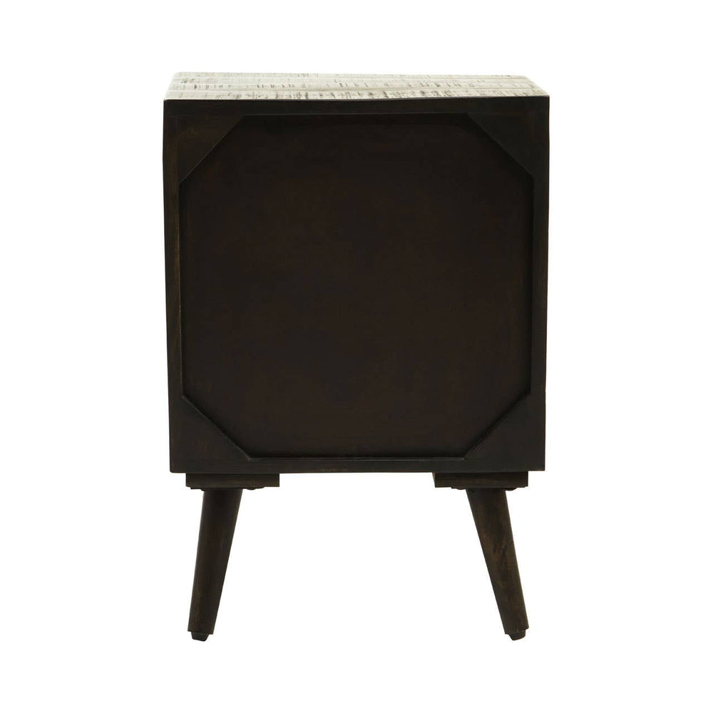 Mango wood cabinet with a brass effect top, featuring a single door and four tapered legs, showcasing a dark finish and geometric design elements