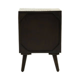 Mango wood cabinet with a brass effect top, featuring a single door and four tapered legs, showcasing a dark finish and geometric design elements