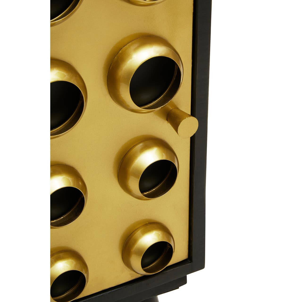 Close-up view of the Arti Mango Wood and Brass Effect One Door Cabinet, showcasing the cabinet's textured surface with circular brass accents and a sleek handle. The rich wood grain is visible, highlighting the natural beauty of the mango wood