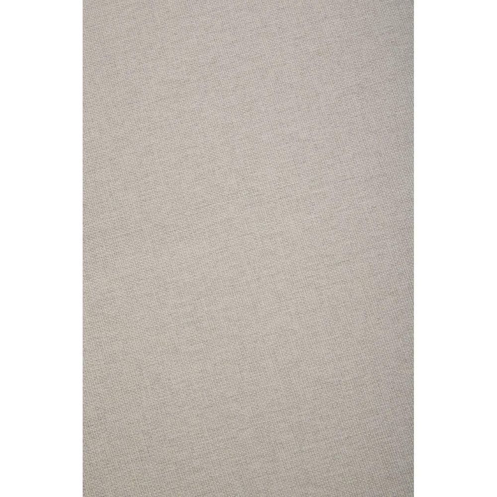 Beige sofa fabric closeup showing linen texture and weave pattern for upholstery