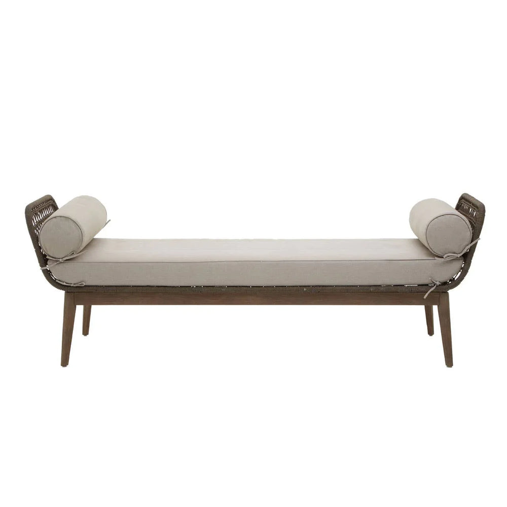 Beige cushioned bench with bolster pillows and wooden frame, front view