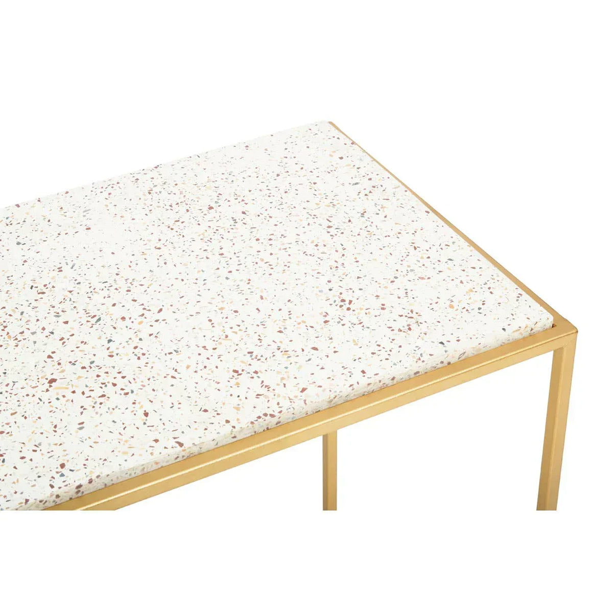 Terrazzo side table with white speckled top and gold metal frame, corner detail view