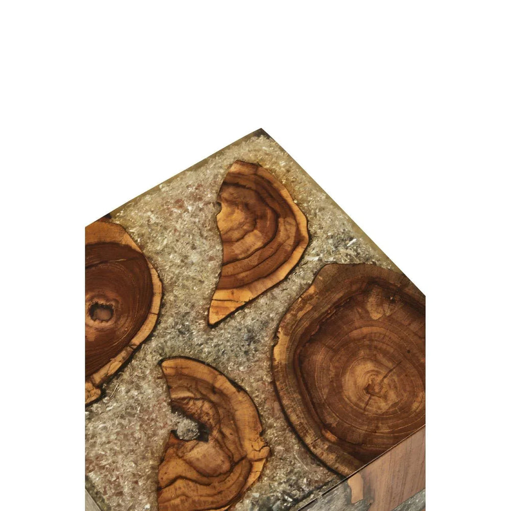 Close up of wood and resin side table top with natural tree slice inlay pattern