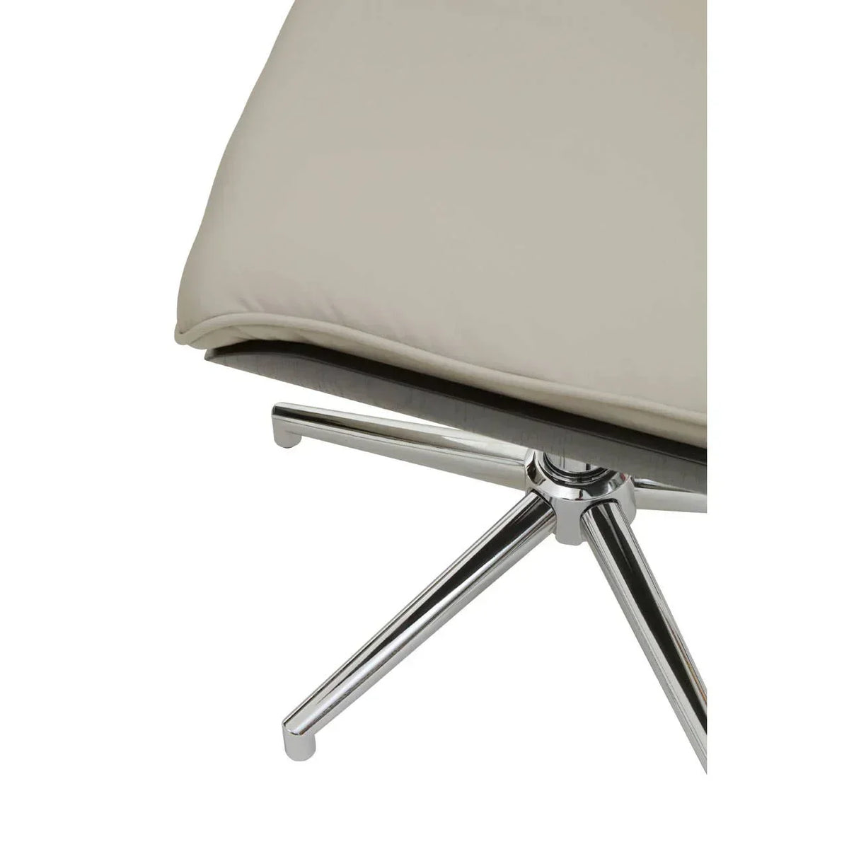 Beige chair seat with chrome metal swivel base, close-up of leg and cushion detail