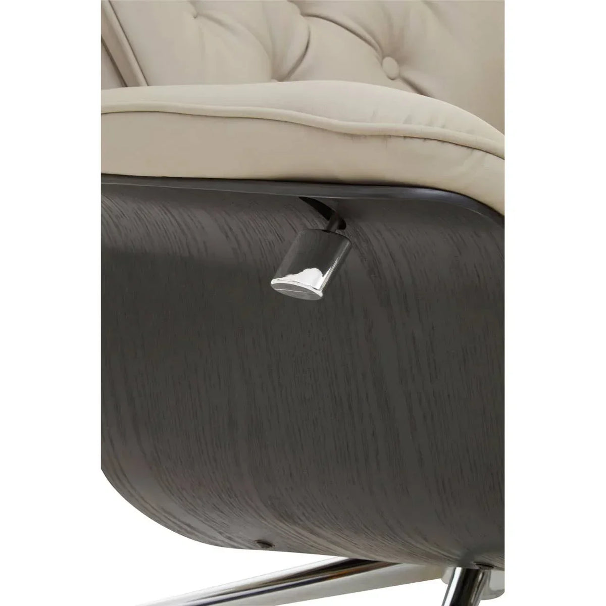Beige upholstered chair with dark wood frame and chrome recliner lever close-up