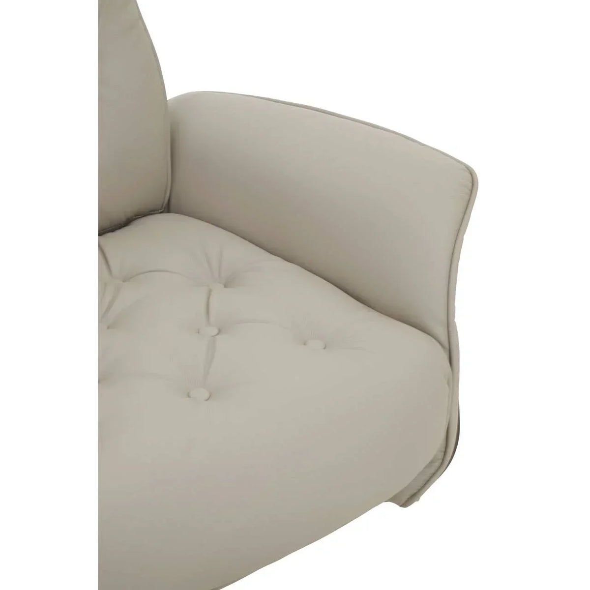 Beige fabric sofa corner with button-tufted seat cushion and curved armrest detail
